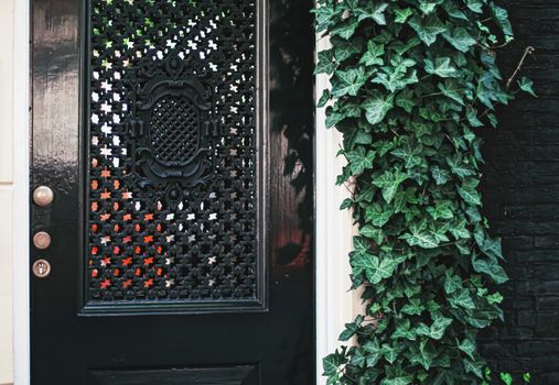 Architectural detail of a building on the main city center street of Amsterdam in Netherlands, european architecture