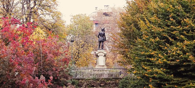 Autumn nature in park, fall leaves and trees outdoors, beautiful season in Milan, Lombardy region in Northern Italy