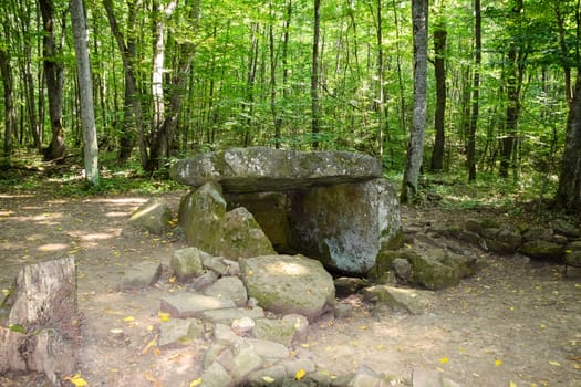 Dolmen in Shapsug. Forest in the city near the village of Shapsugskaya, the sights are dolmens and ruins of ancient civilization.