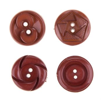 Various sewing button on white background.
