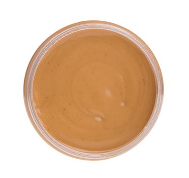 Jar of peanut butter on a white background