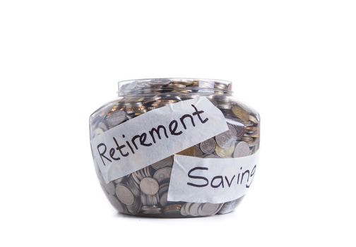 Retirement savings money in jar