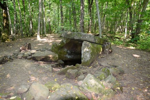 Dolmen in Shapsug. Forest in the city near the village of Shapsugskaya, the sights are dolmens and ruins of ancient civilization.