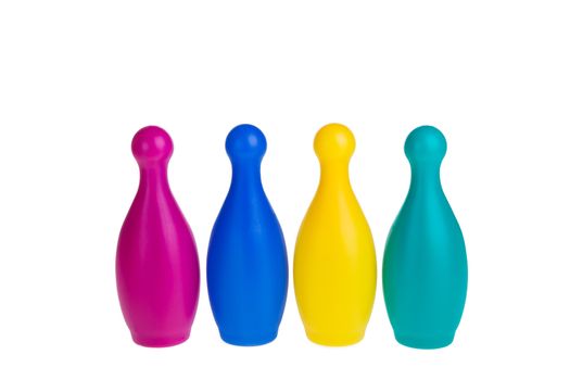 Colorful plastic skittles of toy bowling isolated on a white background
