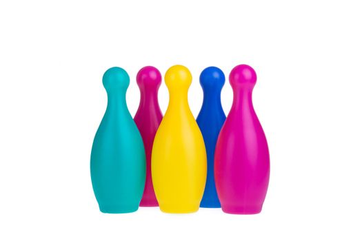 Colorful plastic skittles of toy bowling isolated on a white background
