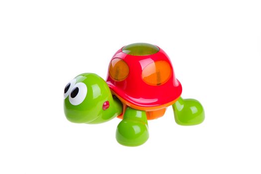 children's toy green turtle isolated on white background