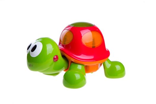 children's toy green turtle isolated on white background