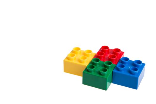 Plastic building blocks isolated on white background