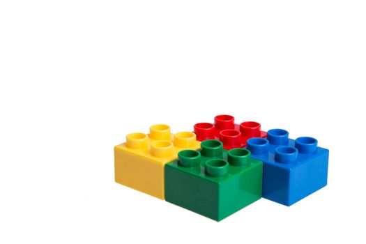 Plastic building blocks isolated on white background