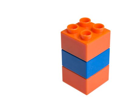 Plastic building blocks isolated on white background