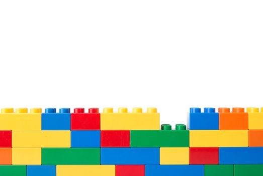 Plastic building blocks isolated on white background