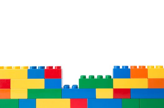 Plastic building blocks isolated on white background