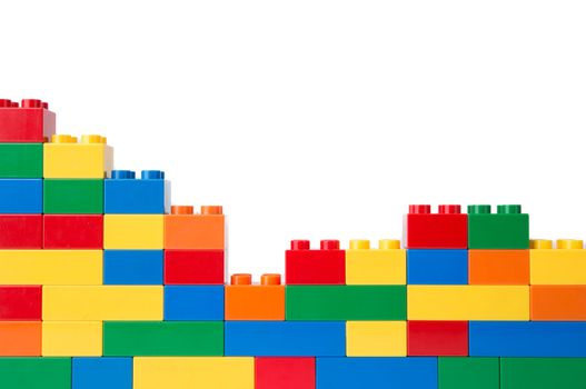 Plastic building blocks isolated on white background
