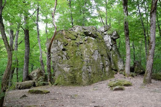 The rock is a bloody finger. Landmark in the Shapsugi Forest.