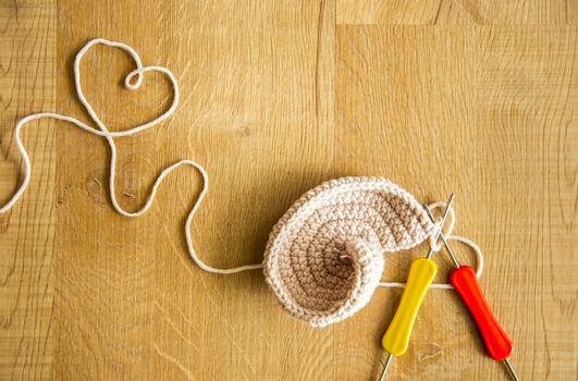 Incomplete knitting project with hook needles