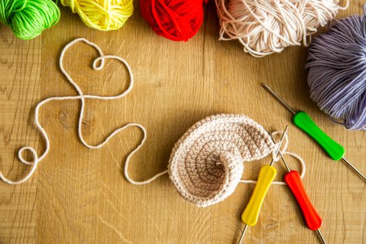 Incomplete knitting project with hook needles