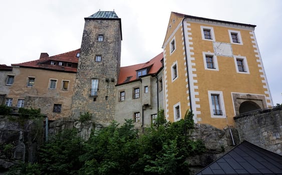 Famous Hohnstein castle with yellow gate in Saxon Switzerland, Germany