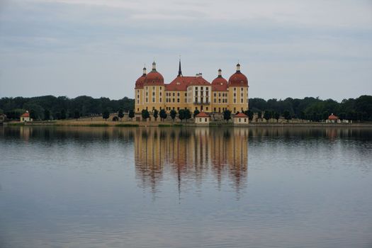 Moritzburg palace and beautiful reflections of the castle in the surrounding lake