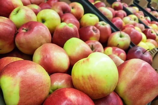 Fresh apples on a vegetable market or in a supermarket