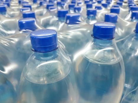 Production and packaging of mineral water in pet bottles.