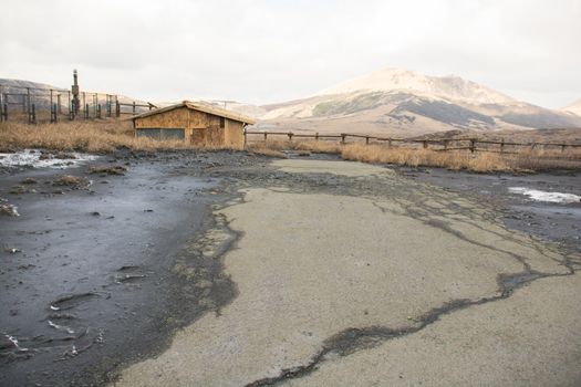 Mount Aso and Kusasenri in winter. covered by golden yellow grassland - Kumamoto, Japan