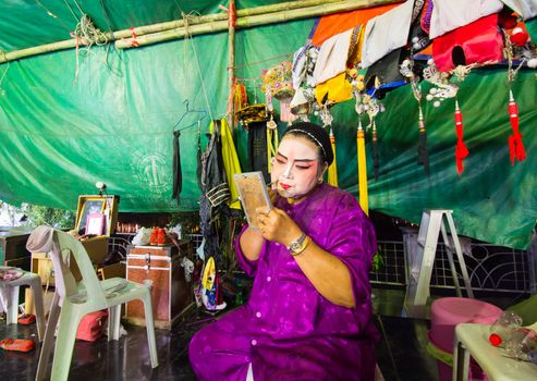 Asia / Thailand - August 28th 2019 : Chinese Opera Actress. Performers make up at backstage. 