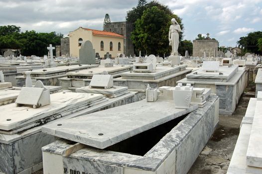 A family tomb opened and awaiting its next body. Havana, Cuba.
