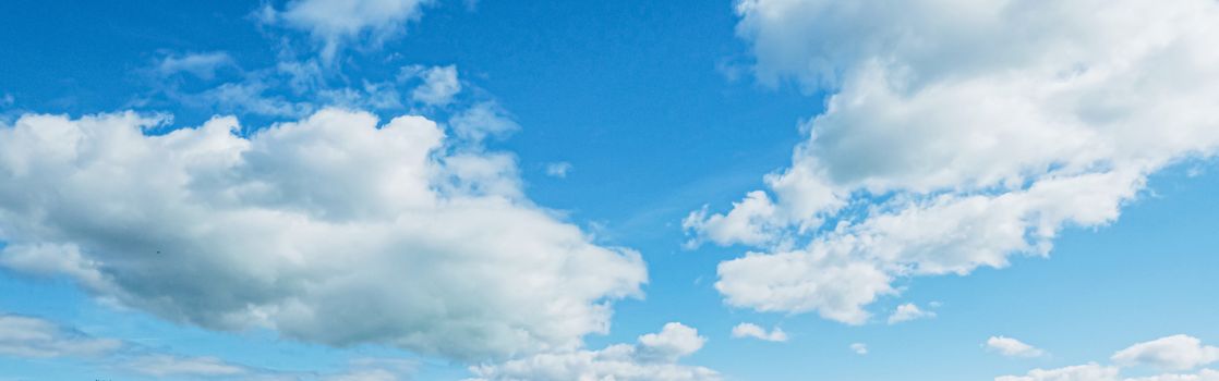 Bright blue sky with clouds, nature and environmental background