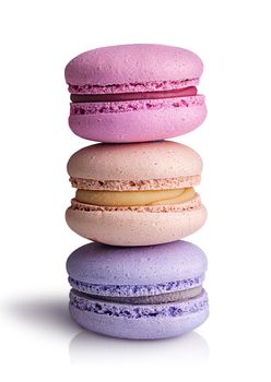 Three macaroon each other on white background