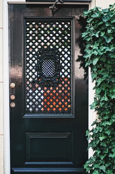 Architectural detail of a building on the main city center street of Amsterdam in Netherlands, european architecture