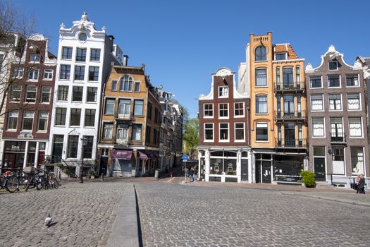 Medieval facades along the canal in the Jordaan in Amsterdam the