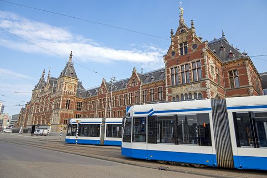 Trams at the central station in Amsterdam Netherlands