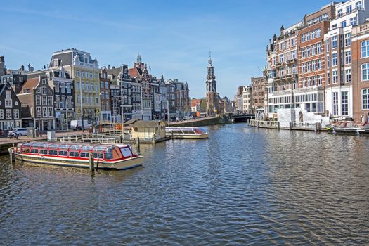 City scenic from Amsterdam in the Netherlands with the Munt tower