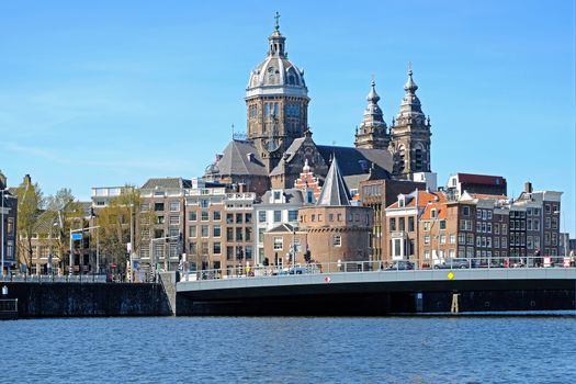 City scenic from Amsterdam in the Netherlands with the Niklaas church