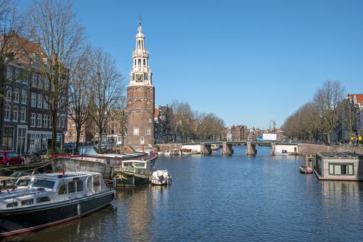 City scenic from Amsterdam in the Netherlands with the Montelbaan tower