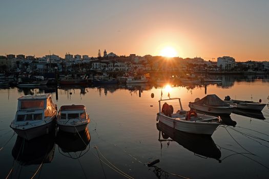The harbor from Lagos in the Algarve Portugal at sunset
