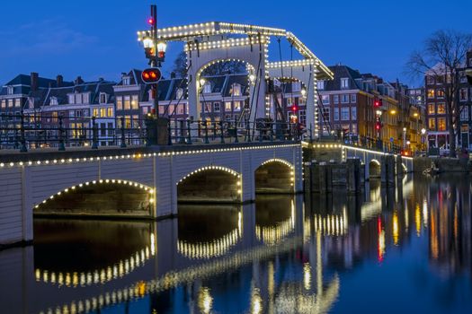 The Tiny Bridge at sunset in Amsterdam the Netherlands