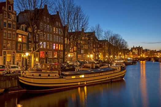 City scenic from Amsterdam with the in the Netherlands at sunset