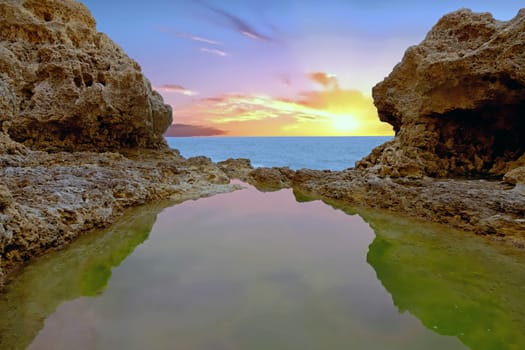 Praia Tres Irmaos in Alvor in the Algarve Portugal at sunset