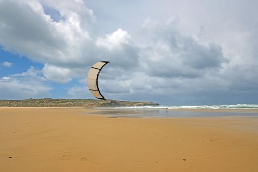 Kite surfing on Carapateira beach in Portugal