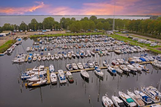 Aerial from the harbour in Almere in the Netherlands at sunset