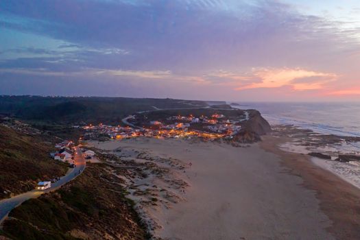 Aerial from Monte Clerigo at the west coast in Portugal at sunse