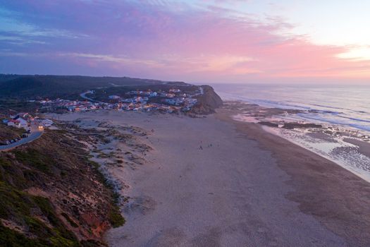 Aerial from Monte Clerigo at the west coast in Portugal at sunset