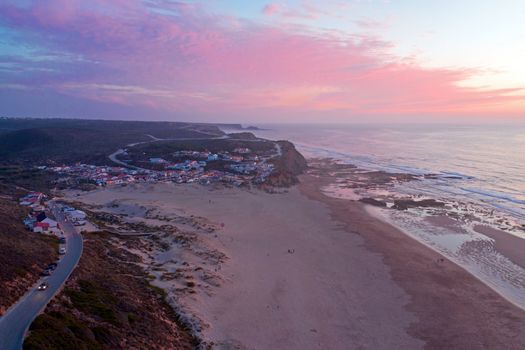 Aerial from Monte Clerigo at the west coast in Portugal at sunset