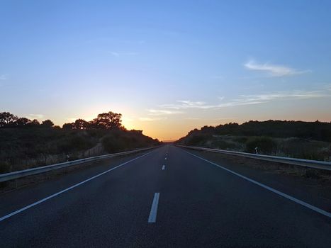Driving on the road at sunset in Portugal