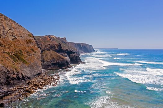 Aerial from natural rocks on Vale Figueiras beach in Portugal