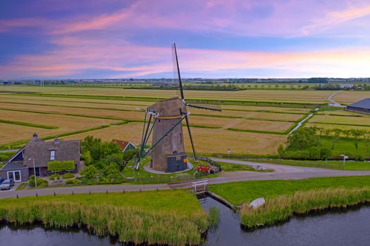 Aerial from a traditional windmill in the countryside from the Netherlands