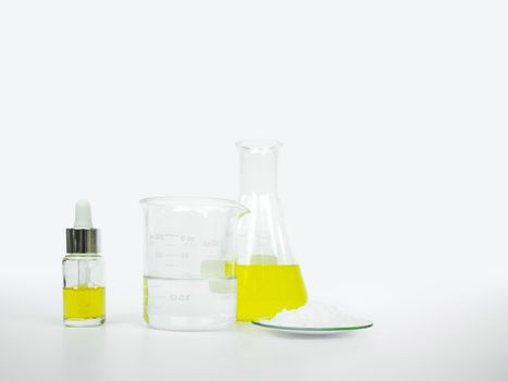 Cosmetic chemicals ingredient on white laboratory table. Polyaluminum chloride liquid, Microcrystalline wax, alcohol