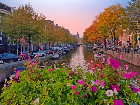 City scenic from Amsterdam in the Netherlands in fall at sunset
