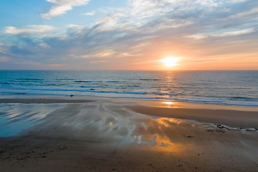 Aerial from Praia Vale Figueiras in Portugal at sunset